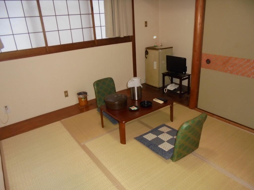 Yoshino Ryokan Осака Экстерьер фото